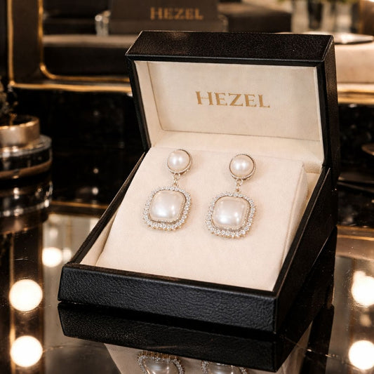 Hezel premium pearl halo drop earrings presented in luxury branded jewelry box with elegant finish