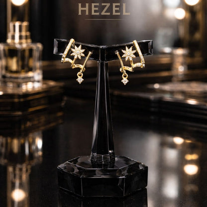 Hezel gold plated designer hoop earrings with sparkling stones on black display stand