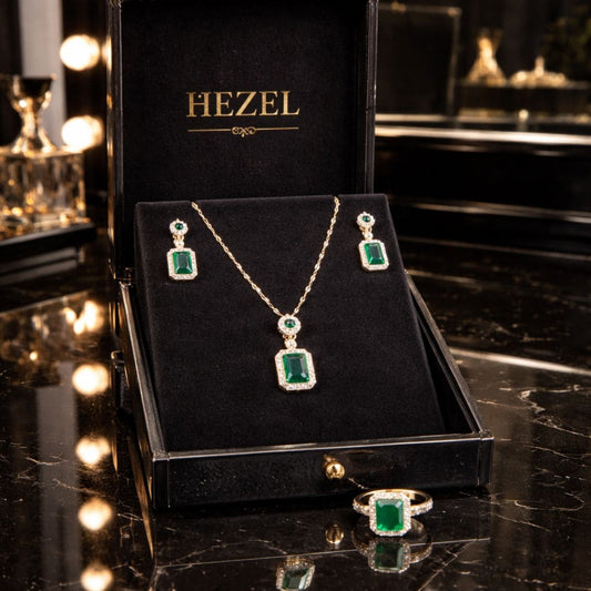Hezel emerald pendant necklace with matching earrings and ring set in luxury jewellery box