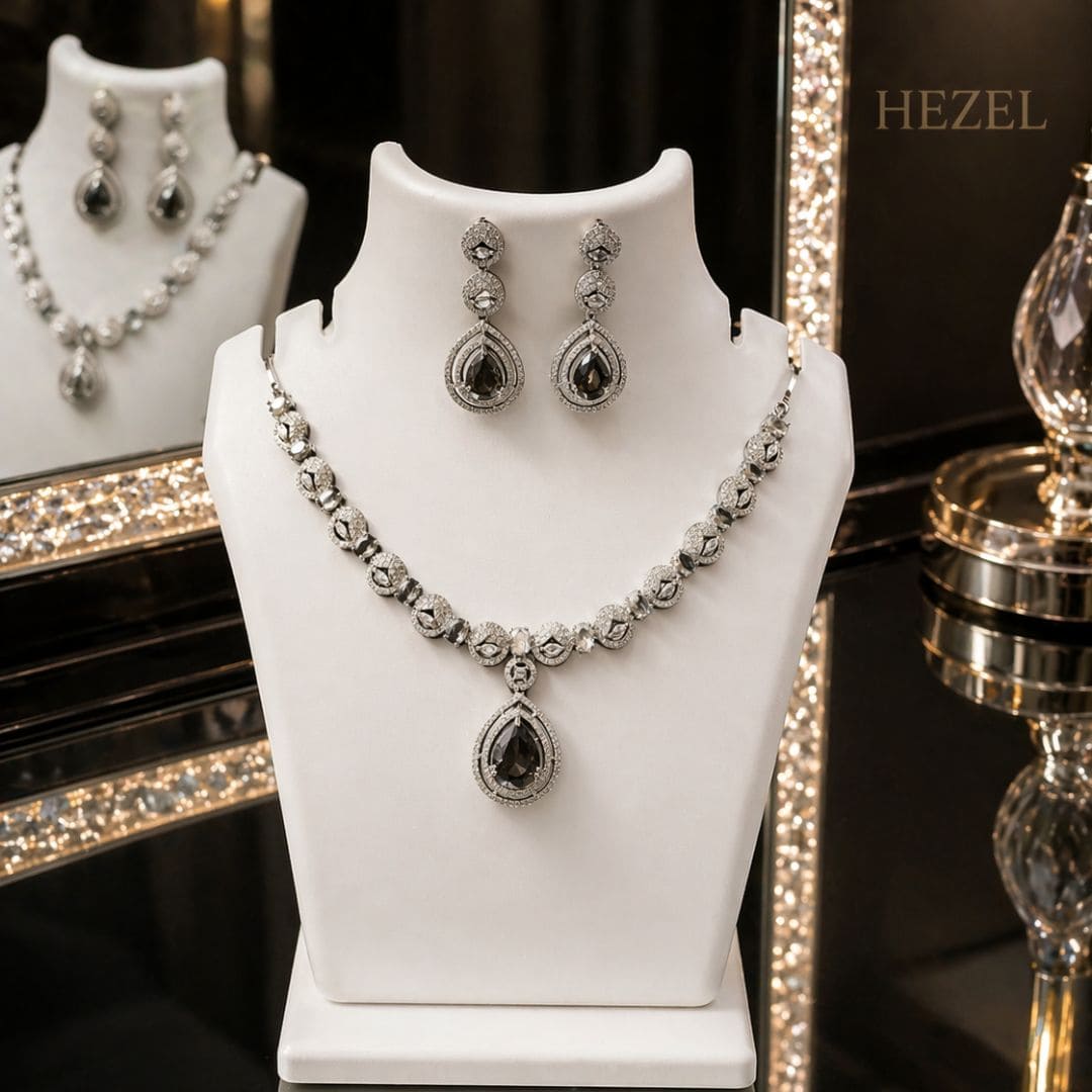 HEZEL silver teardrop necklace set with matching earrings on elegant