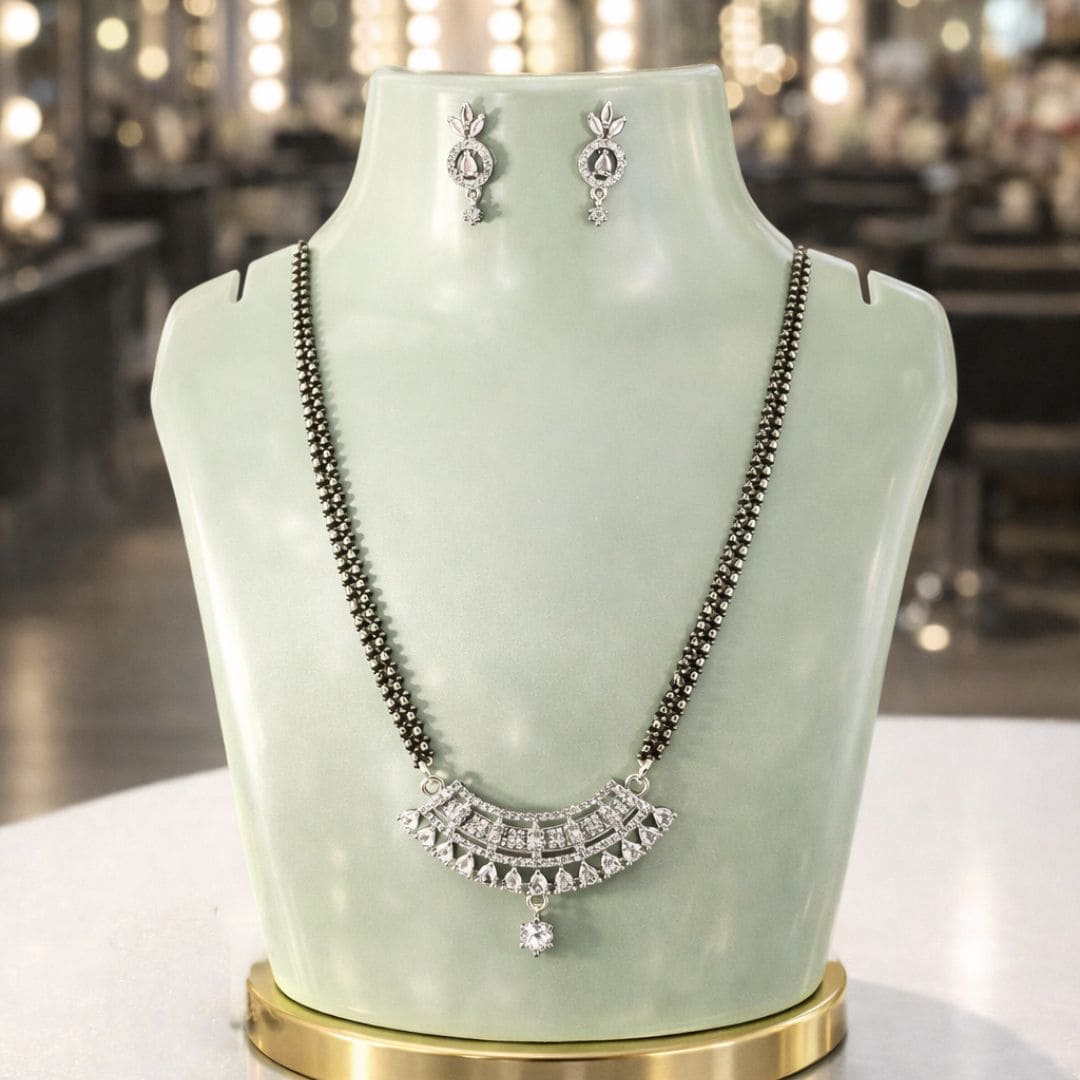 Elegant black bead mangalsutra set with sparkling pendant and earrings | Hezel Jewellery