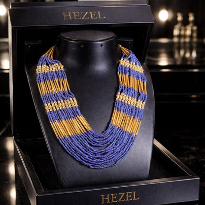Hezel handcrafted blue bead and gold layered statement necklace displayed in premium luxury gift box for elegant traditional, festive, and party wear