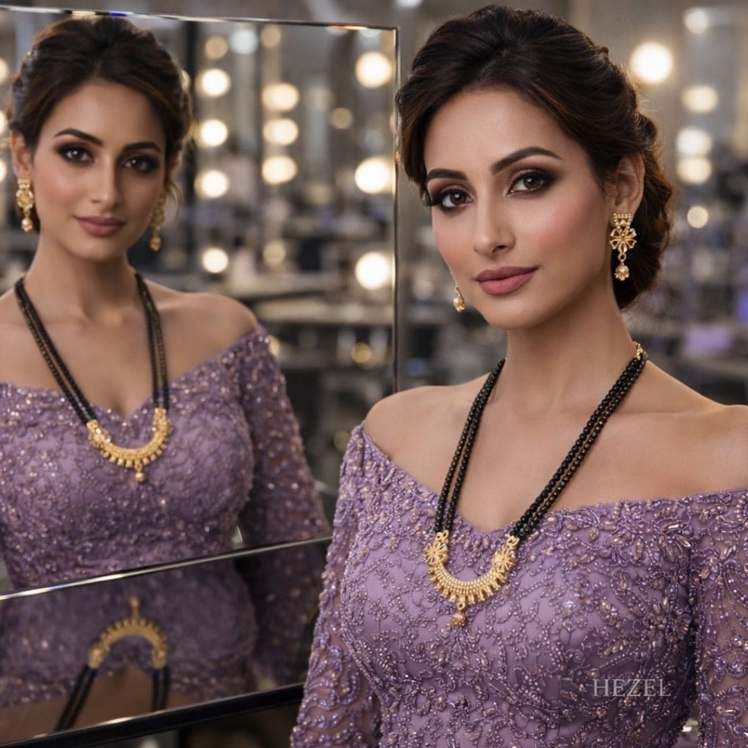 HEZEL black bead mangalsutra set with gold pendant and matching earrings worn by an elegant model in a lavender embellished gown.