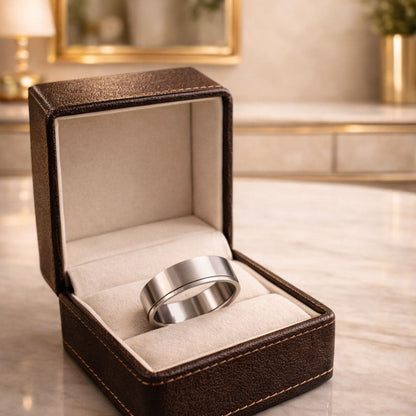 HEZEL minimalist silver band ring with dual groove design presented in premium leather jewelry box on elegant marble surface