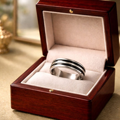 Hezel premium striped stainless steel ring presented in a luxury wooden jewelry box with velvet interior.