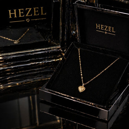 HEZEL gold heart pendant necklace in luxury black box packaging, elegant minimal jewellery gift for women, perfect for wedding and special occasions.