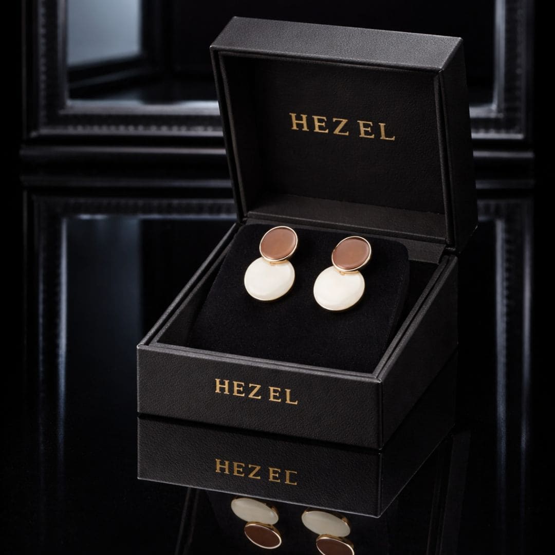 Hezel premium gold and pearl stud earrings presented in luxury branded box with elegant finish