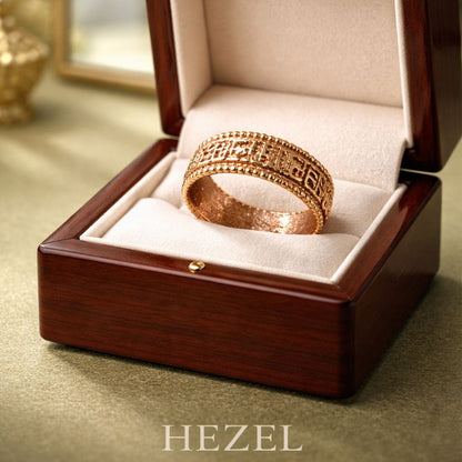 HEZEL rose gold textured band ring with intricate geometric engraving displayed in premium wooden jewelry box