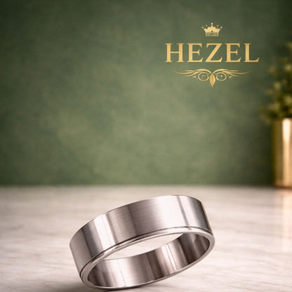 HEZEL minimalist brushed silver band ring with smooth finish on marble surface with premium green gradient background