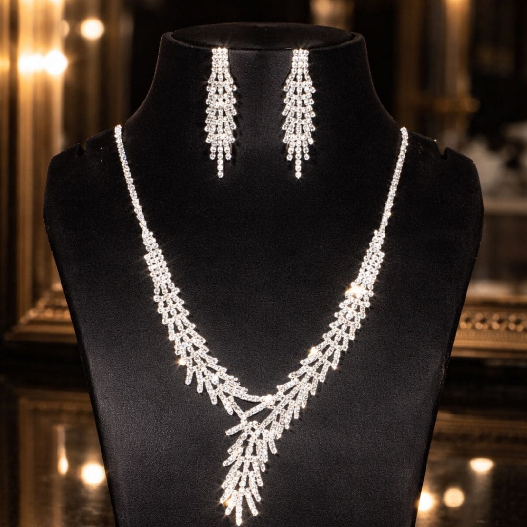 Hezel elegant silver crystal necklace and matching chandelier earrings set displayed on premium jewelry stand for bridal, wedding, and party wear