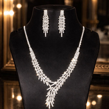 Hezel elegant silver crystal necklace and matching chandelier earrings set displayed on premium jewelry stand for bridal, wedding, and party wear