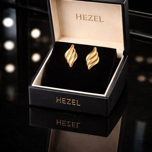 HEZEL gold leaf stud earrings in luxury black jewelry gift box