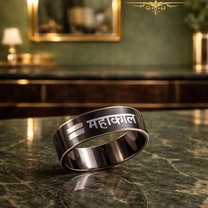 HEZEL black and silver band ring with Mahakal Hindi engraving on marble surface in premium luxury settingbox