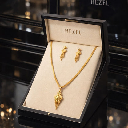 HEZEL luxury gold pendant necklace and earrings set displayed in premium black jewellery gift box