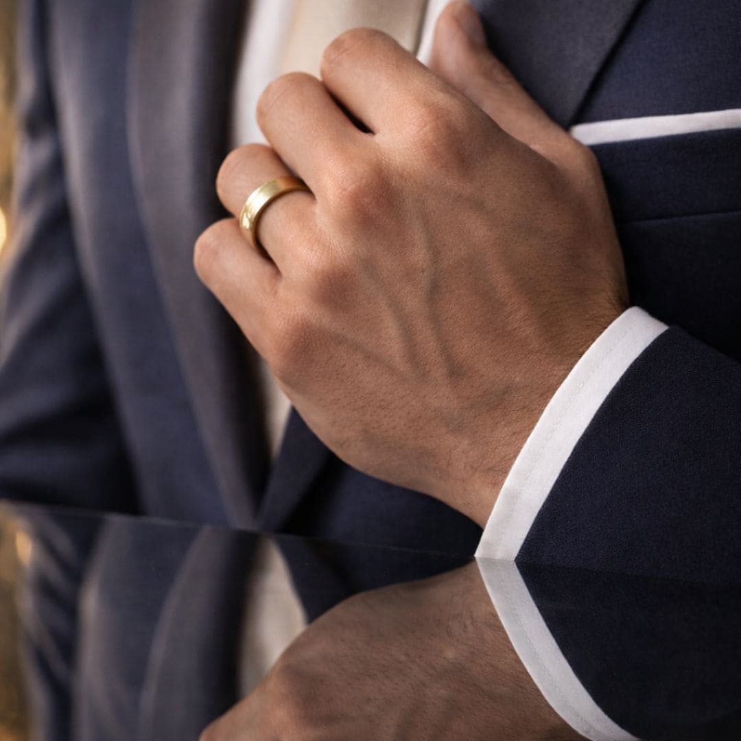 HEZEL elegant gold band ring worn with a formal suit, showcasing a sophisticated and timeless style with a refined, premium loo