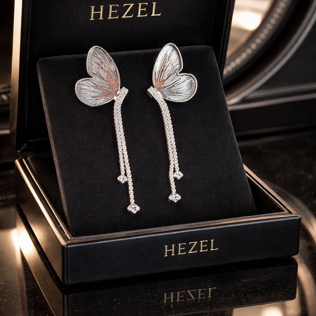 Hezel butterfly long drop earrings with crystal detailing in luxury jewellery box