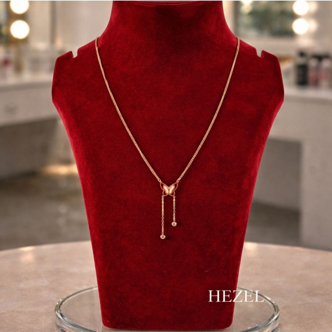 Hezel elegant butterfly pendant necklace displayed on premium red velvet stand