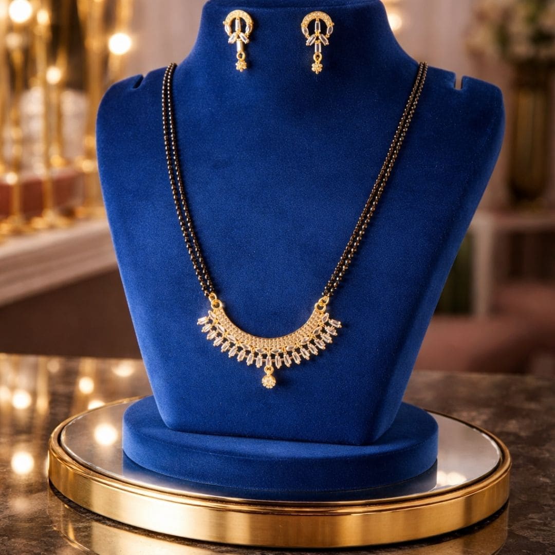 premium mangalsutra jewellery display for Hezel featuring elegant gold detailing, royal blue velvet styling, and luxurious warm lighting aesthetic