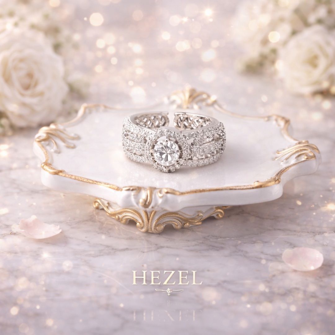 HEZEL diamond-studded statement ring with central stone, elegantly displayed on a luxury marble tray.