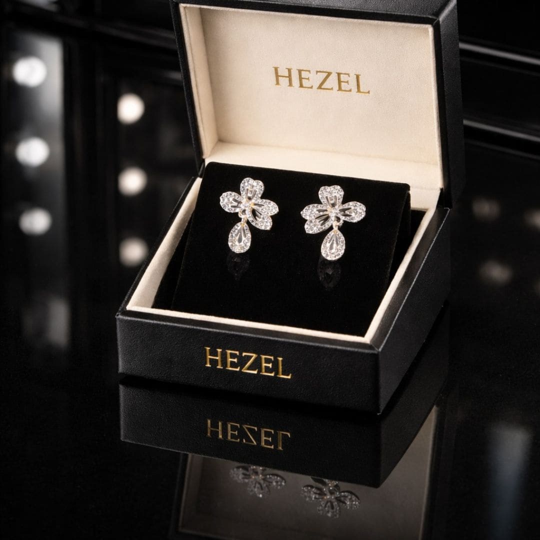 HEZEL floral drop earrings in a luxury black jewelry box, elegant sparkling design with premium finish