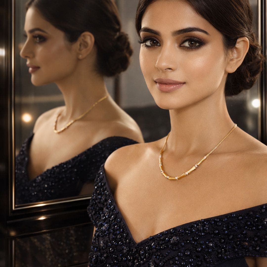 Elegant gold chain necklace with subtle detailing, styled on a model for a refined and sophisticated HEZEL look.
