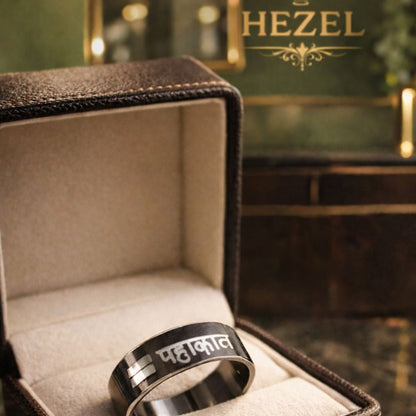 HEZEL engraved black and silver band ring with Hindi lettering presented in premium leather jewelry box