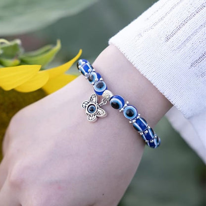 Blue Evil Eye Beaded Stretch Bracelet With A Butterfly Charm