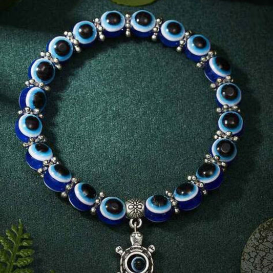 Blue Evil Eye Beaded Stretch Bracelet With A Turtle Charm
